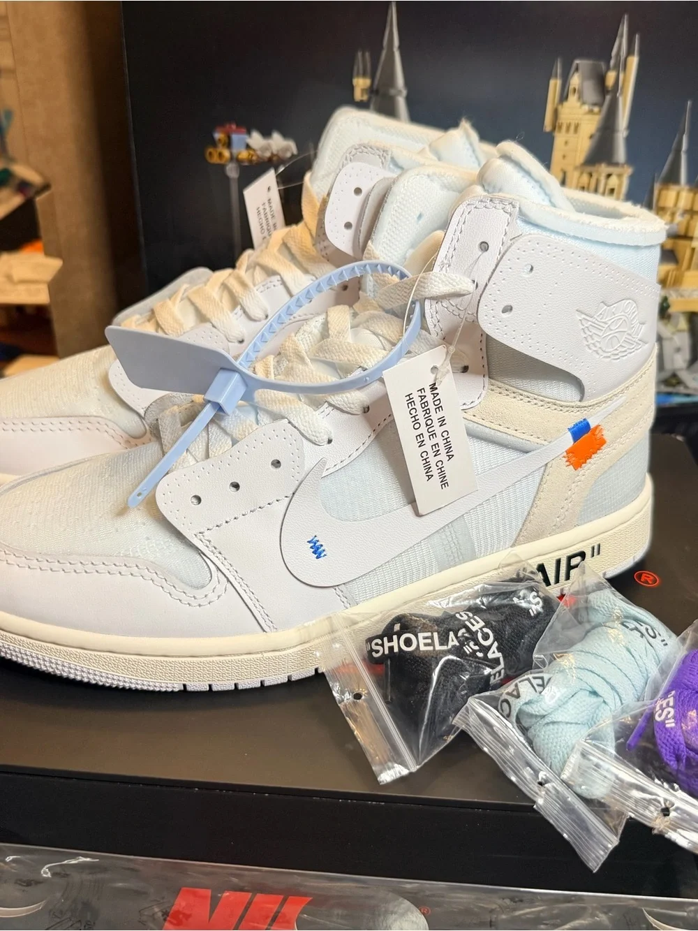 Jordan Men’s High-Top Sneakers in White with Light Blue Accents